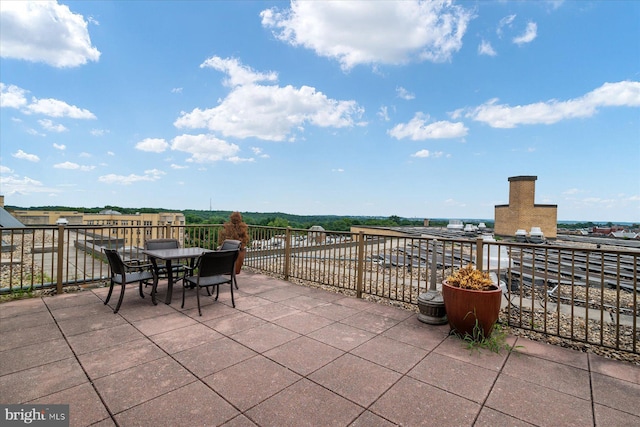 view of patio featuring outdoor dining area