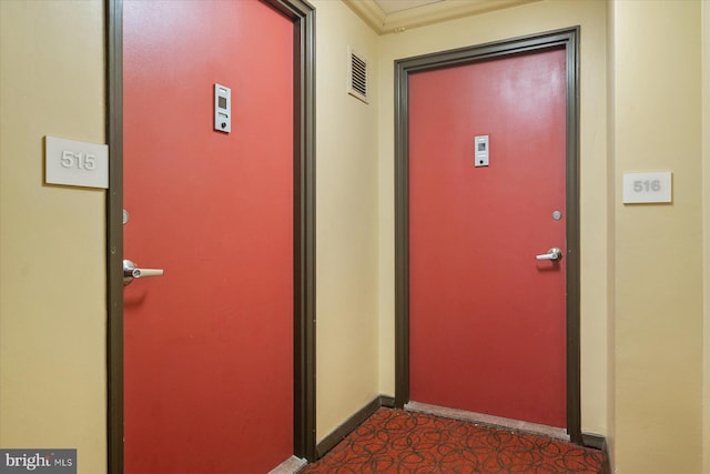 doorway to property with visible vents