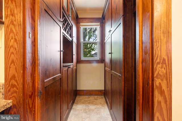 doorway to outside with baseboards