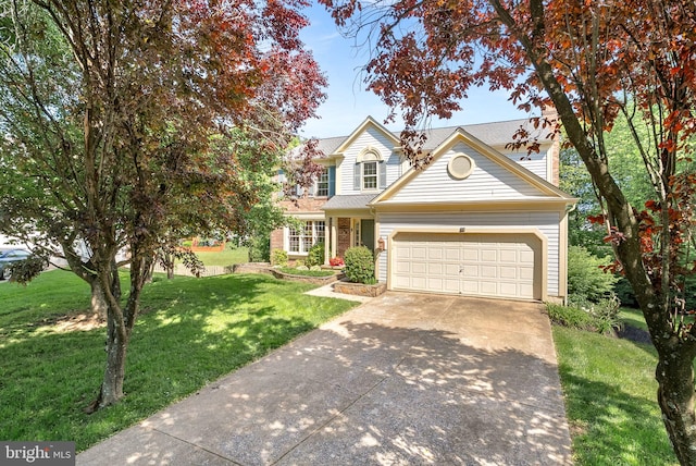 traditional home featuring an attached garage, concrete driveway, and a front lawn