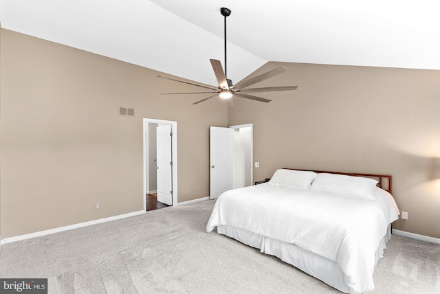 carpeted bedroom featuring high vaulted ceiling, baseboards, and ceiling fan