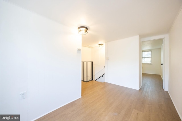 empty room featuring wood finished floors