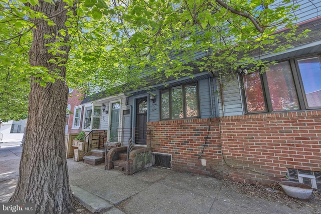 view of front of property with brick siding