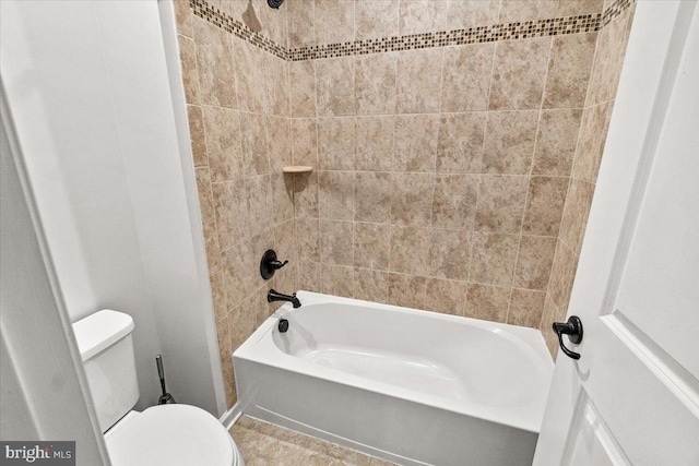 full bath featuring toilet and shower / washtub combination