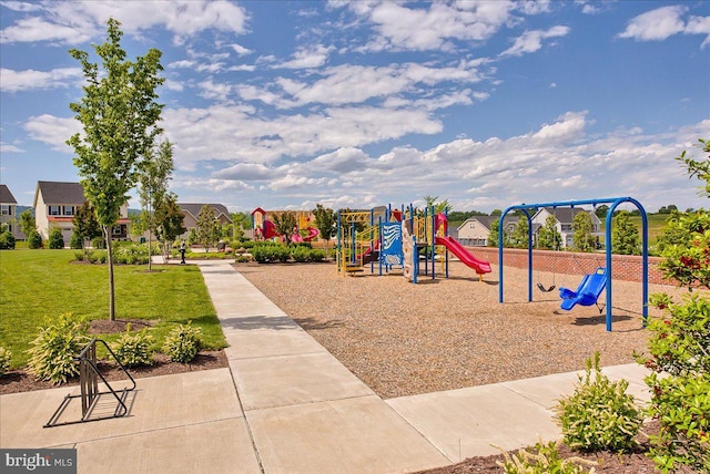 community playground with a lawn