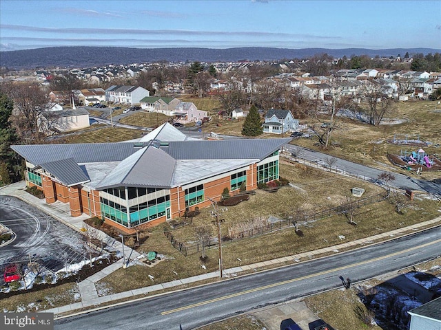aerial view featuring a mountain view and a residential view