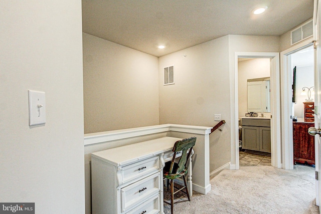 office space featuring recessed lighting, visible vents, light carpet, and baseboards