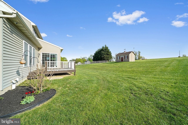 view of yard with a deck