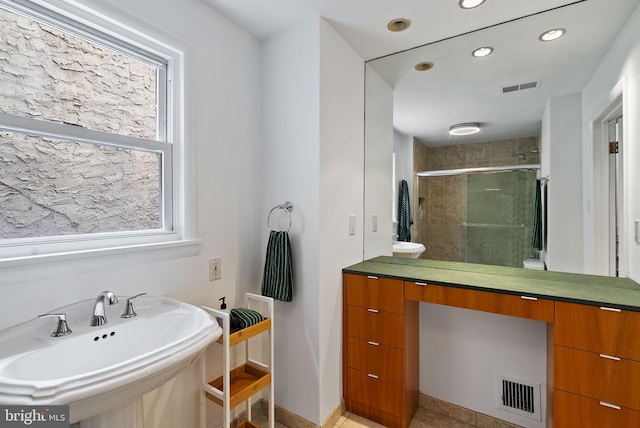 913 Spruce St, Philadelphia, PA 19107 - bathroom with a sink, a shower stall, recessed lighting, and baseboards