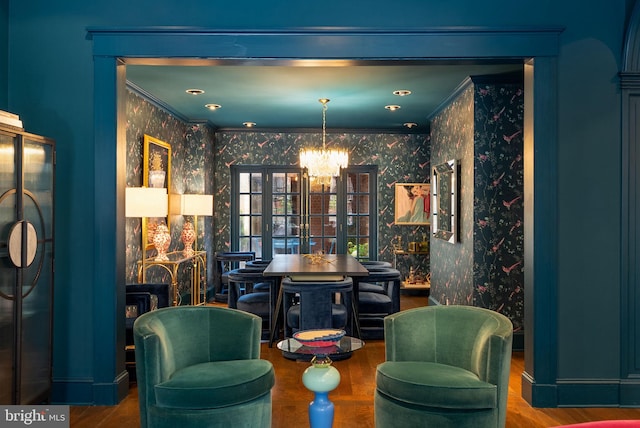 913 Spruce St, Philadelphia, PA 19107 - sitting room with a chandelier, wallpapered walls, ornamental molding, and wood finished floors