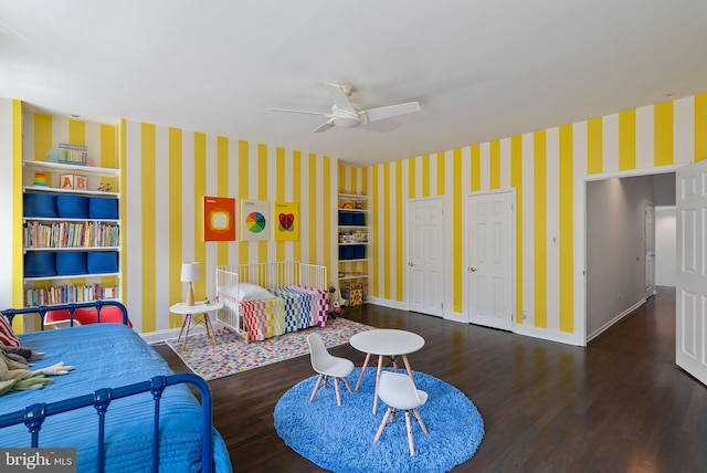 913 Spruce St, Philadelphia, PA 19107 - living room with wallpapered walls, wood finished floors, baseboards, and a ceiling fan
