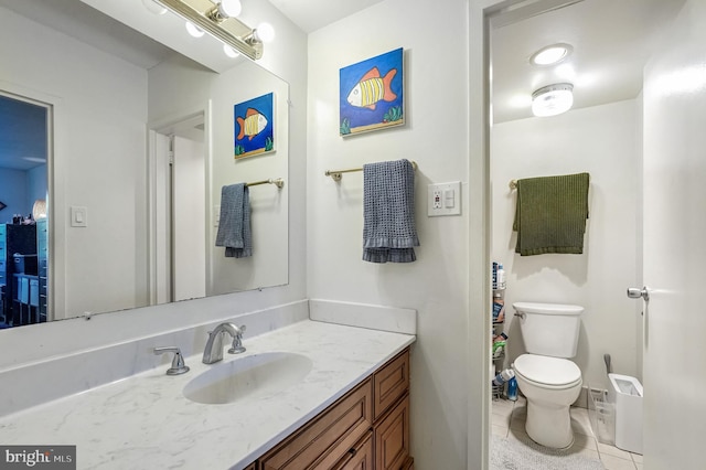 4515 Willard Ave Unit 1710S, Chevy Chase, MD 20815 - bathroom featuring toilet, tile patterned floors, and vanity