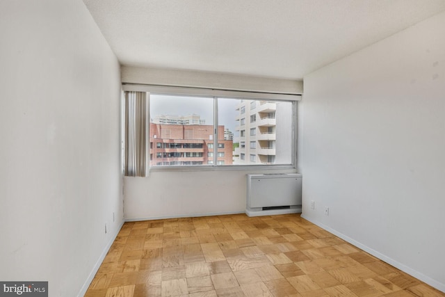 4515 Willard Ave Unit 1710S, Chevy Chase, MD 20815 - empty room with baseboards