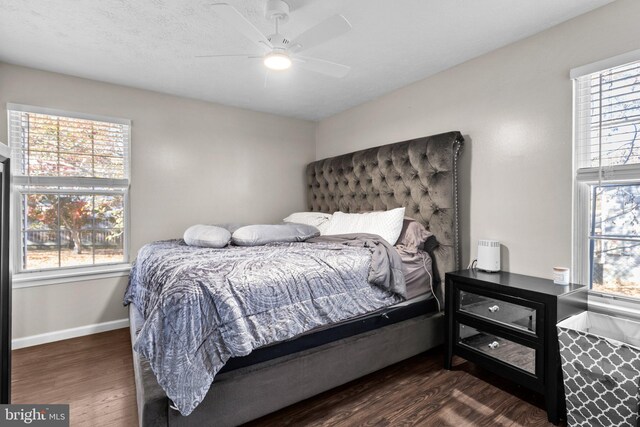 10205 Queen Elizabeth Dr, Upper Marlboro, MD 20772 - bedroom featuring wood finished floors, a ceiling fan, and baseboards