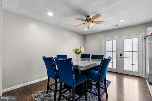 10205 Queen Elizabeth Dr, Upper Marlboro, MD 20772 - dining space with a ceiling fan, visible vents, a textured ceiling, french doors, and wood finished floors
