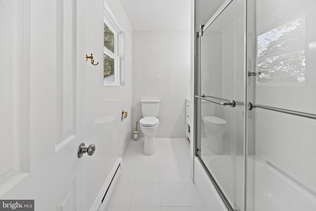 bathroom featuring toilet, tile patterned floors, and baseboard heating