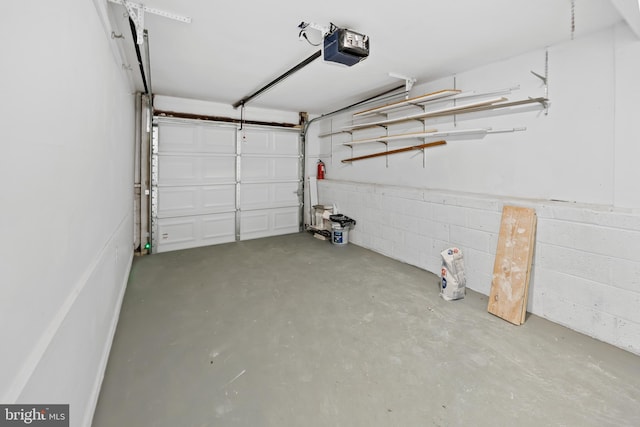 garage featuring a garage door opener