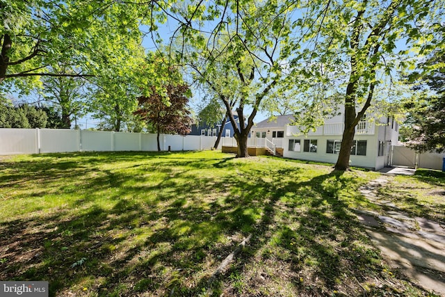 view of yard with a gate and fence