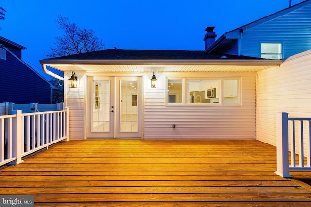 wooden deck featuring french doors
