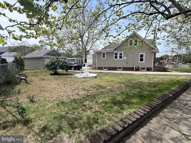 view of yard with fence