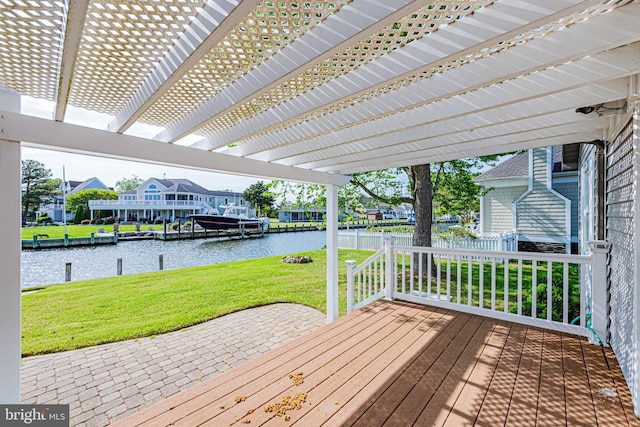 wooden terrace featuring a water view, a yard, a pergola, and a residential view