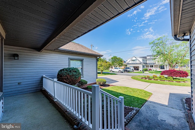 view of patio with a porch and a residential view