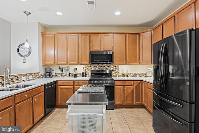 44365 Adare Manor Sq, Ashburn, VA 20147 - kitchen with black appliances, a sink, decorative backsplash, pendant lighting, and light tile patterned floors