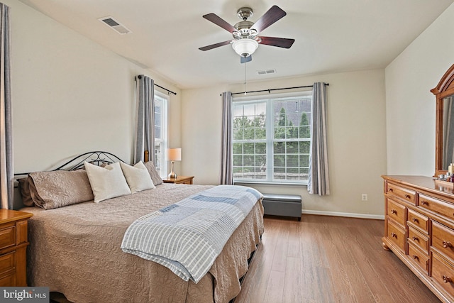 44365 Adare Manor Sq, Ashburn, VA 20147 - bedroom featuring wood finished floors, baseboards, and ceiling fan