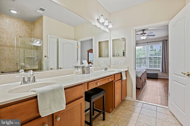 44365 Adare Manor Sq, Ashburn, VA 20147 - full bath with double vanity, tiled shower, ceiling fan, tile patterned flooring, and connected bathroom