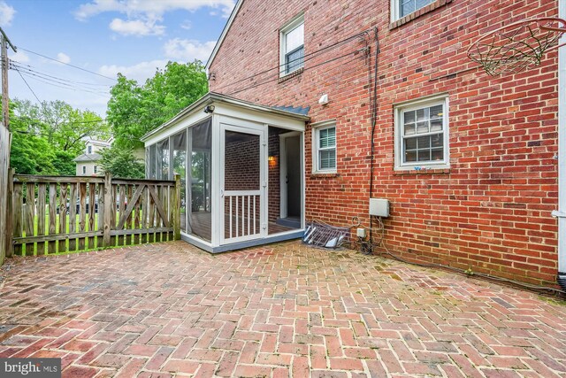 1918 Brisbane St, Silver Spring, MD 20902 - view of patio / terrace with a sunroom and fence