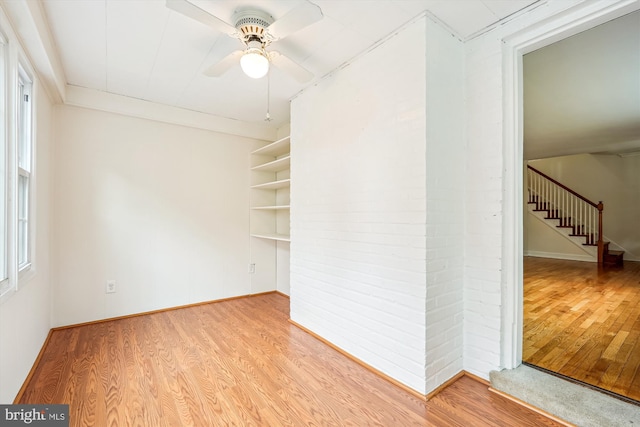 1918 Brisbane St, Silver Spring, MD 20902 - unfurnished room with wood finished floors, ceiling fan, stairs, and baseboards