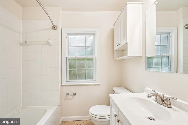 1918 Brisbane St, Silver Spring, MD 20902 - bathroom with toilet, tile patterned flooring, healthy amount of natural light, and vanity