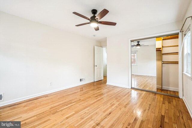 1918 Brisbane St, Silver Spring, MD 20902 - unfurnished bedroom featuring hardwood / wood-style floors, baseboards, ceiling fan, and a closet