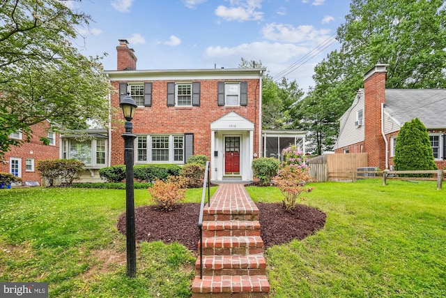 1918 Brisbane St, Silver Spring, MD 20902 - view of front of house featuring brick siding and a chimney