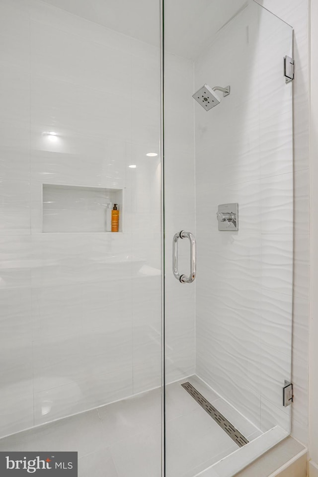 full bath featuring a stall shower
