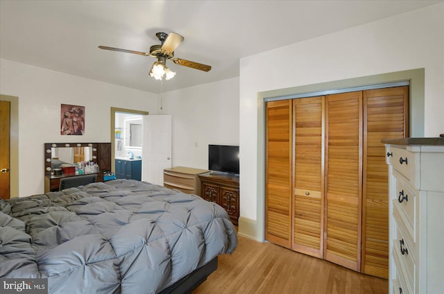 115 Penn St, Millheim, PA 16854 - bedroom featuring light wood-style floors, ceiling fan, and a closet