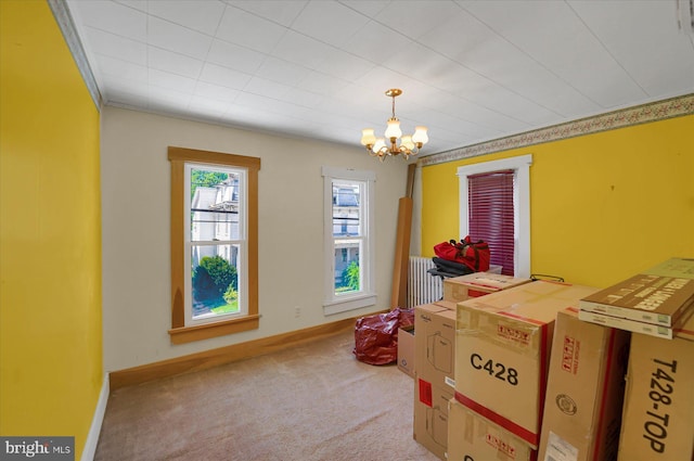 115 Penn St, Millheim, PA 16854 - interior space with an inviting chandelier, carpet floors, and baseboards