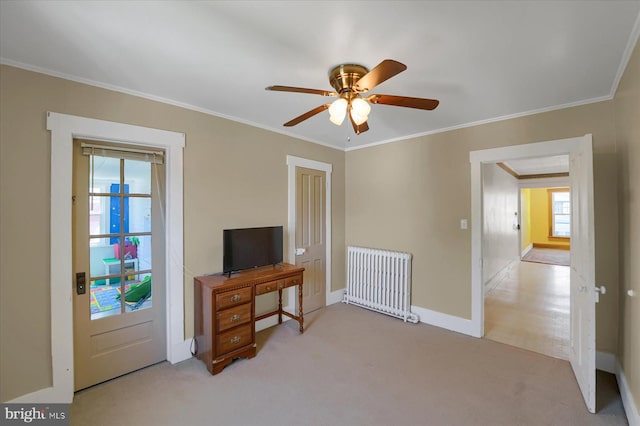 115 Penn St, Millheim, PA 16854 - interior space featuring ornamental molding, radiator, baseboards, ceiling fan, and carpet flooring