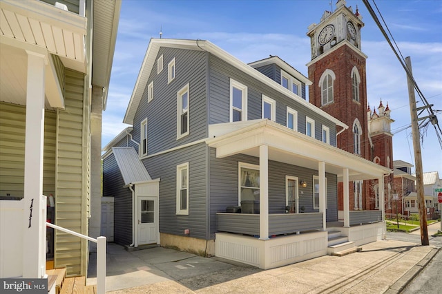 115 Penn St, Millheim, PA 16854 - view of front of house with a porch