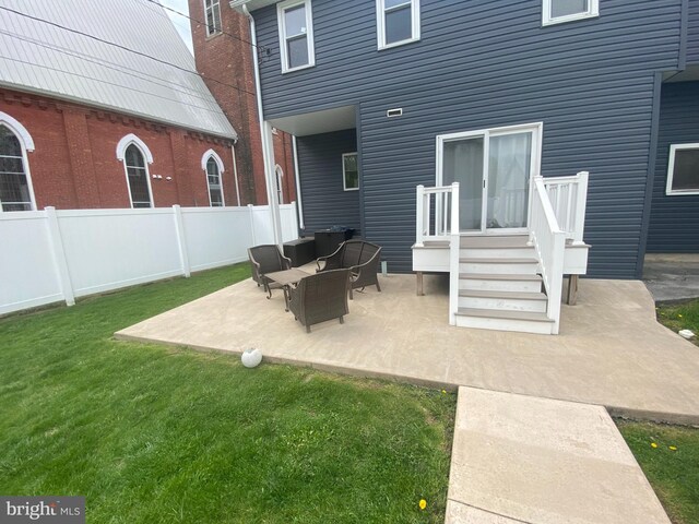 115 Penn St, Millheim, PA 16854 - exterior space with a patio, a lawn, and fence