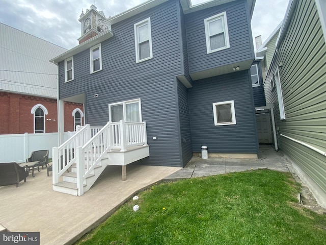 115 Penn St, Millheim, PA 16854 - rear view of property featuring fence and a patio