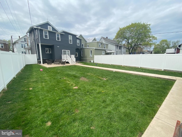 115 Penn St, Millheim, PA 16854 - view of yard featuring a patio, a fenced backyard, and a residential view