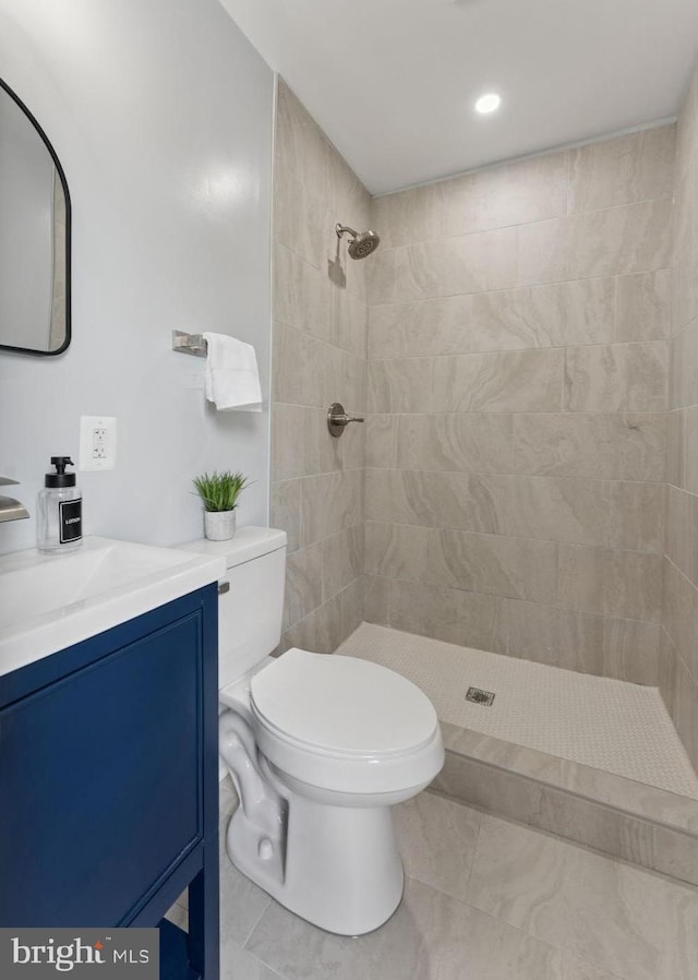 17 Longfellow St NW, Washington, DC 20011 - bathroom with a tile shower, vanity, and tile patterned floors