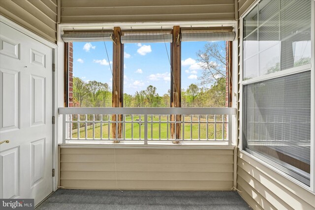 unfurnished sunroom with a healthy amount of sunlight