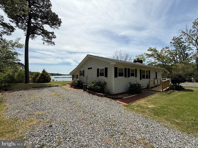 2260 Iberis Rd, Lancaster, VA 22503 - exterior space with a chimney, a yard, and a water view