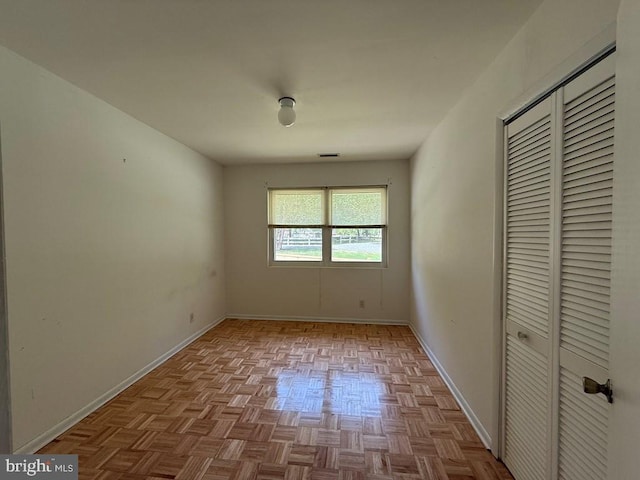 2260 Iberis Rd, Lancaster, VA 22503 - unfurnished bedroom with baseboards, visible vents, and a closet