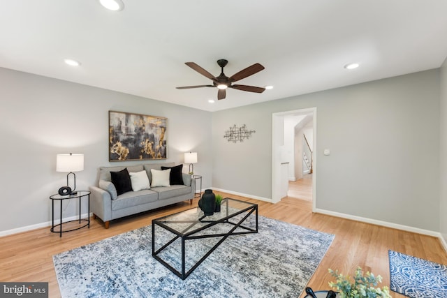 1111 Woodside Pkwy, Silver Spring, MD 20910 - living room featuring baseboards, light wood finished floors, a ceiling fan, and recessed lighting