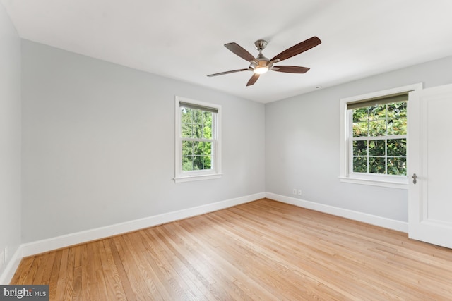 1111 Woodside Pkwy, Silver Spring, MD 20910 - empty room featuring a ceiling fan, baseboards, and light wood finished floors