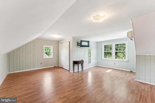 1111 Woodside Pkwy, Silver Spring, MD 20910 - bonus room with baseboards, a wall mounted AC, and wood finished floors