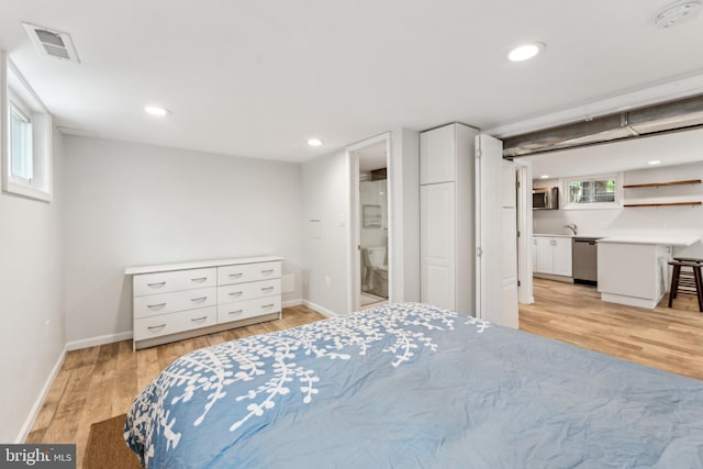 1111 Woodside Pkwy, Silver Spring, MD 20910 - bedroom with recessed lighting, baseboards, visible vents, and light wood-style flooring